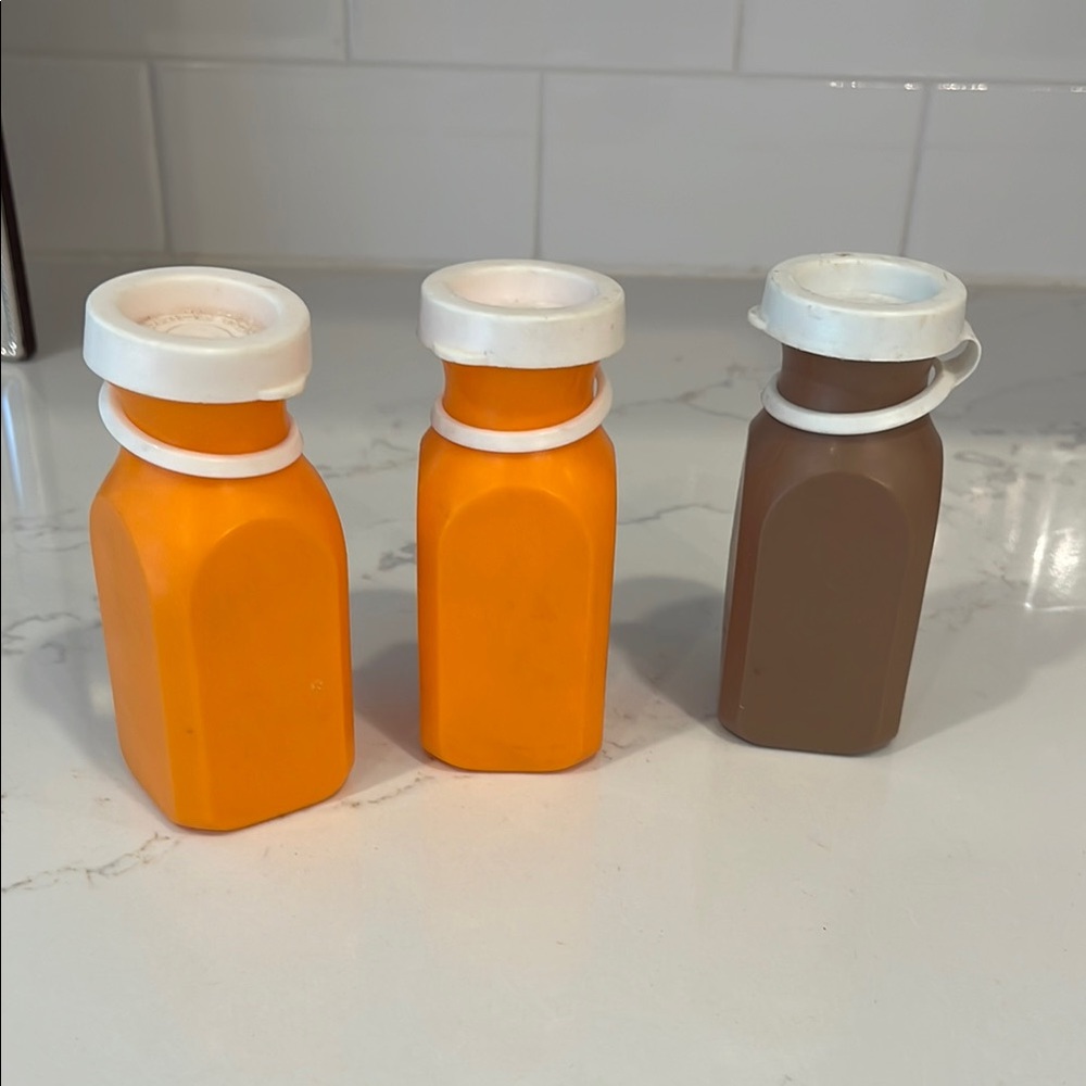 Fisher-Price Orange and Brown Toy Bottles